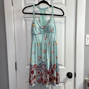 Mint green dress with floral detailing